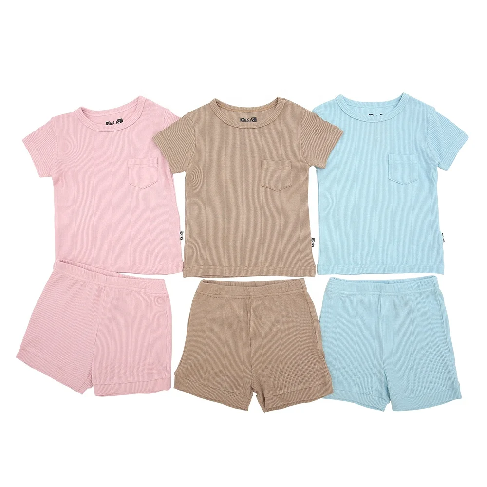 Eco-friendly bamboo kids daywear in vibrant designs, perfect for B2B wholesale buyers seeking sustainable and comfortable children's clothing options.