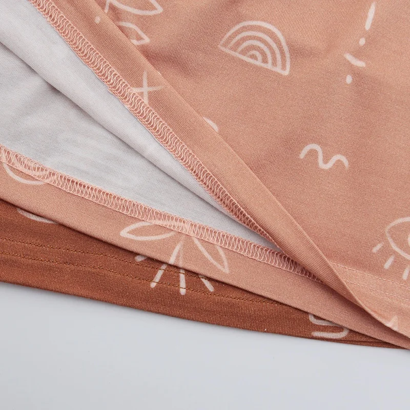 Wholesale bamboo pajamas and baby clothes mystery box - sustainable, soft fabrics perfect for retailers seeking eco-friendly baby apparel.