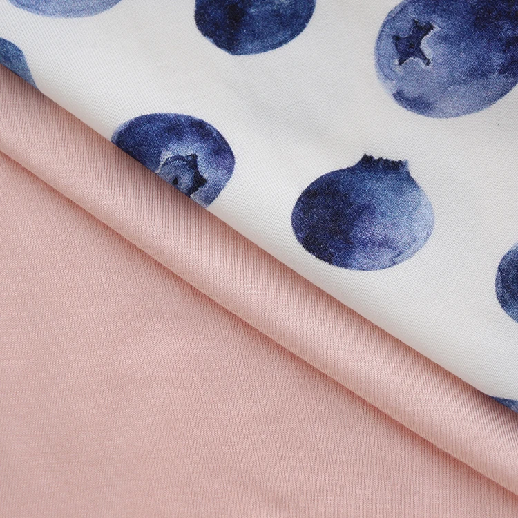 High-quality wholesale bamboo fabric featuring unique character designs, ideal for sustainable clothing manufacturers and B2B fashion businesses.