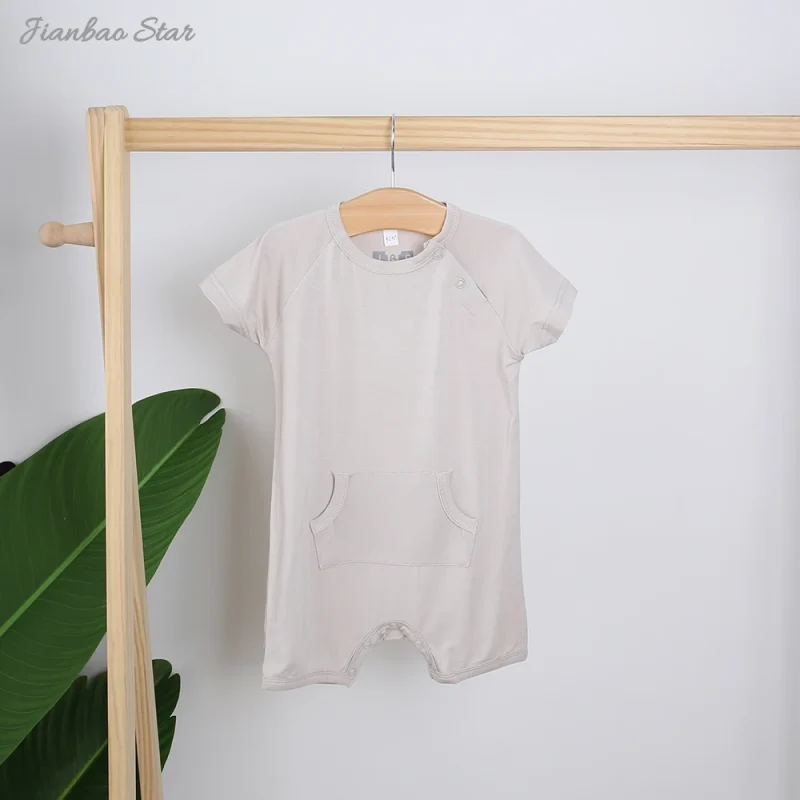 Hot Sale Casual High Quality Comfortable 100% Cotton Knitted Buttons Short Sleeved Pocket Summer Style New Born Baby Romper