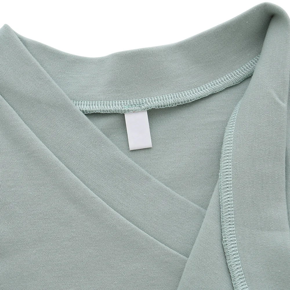 Soft unbranded bamboo baby pajamas in neutral tones, perfect for B2B wholesale buyers seeking eco-friendly, high-quality infant apparel.